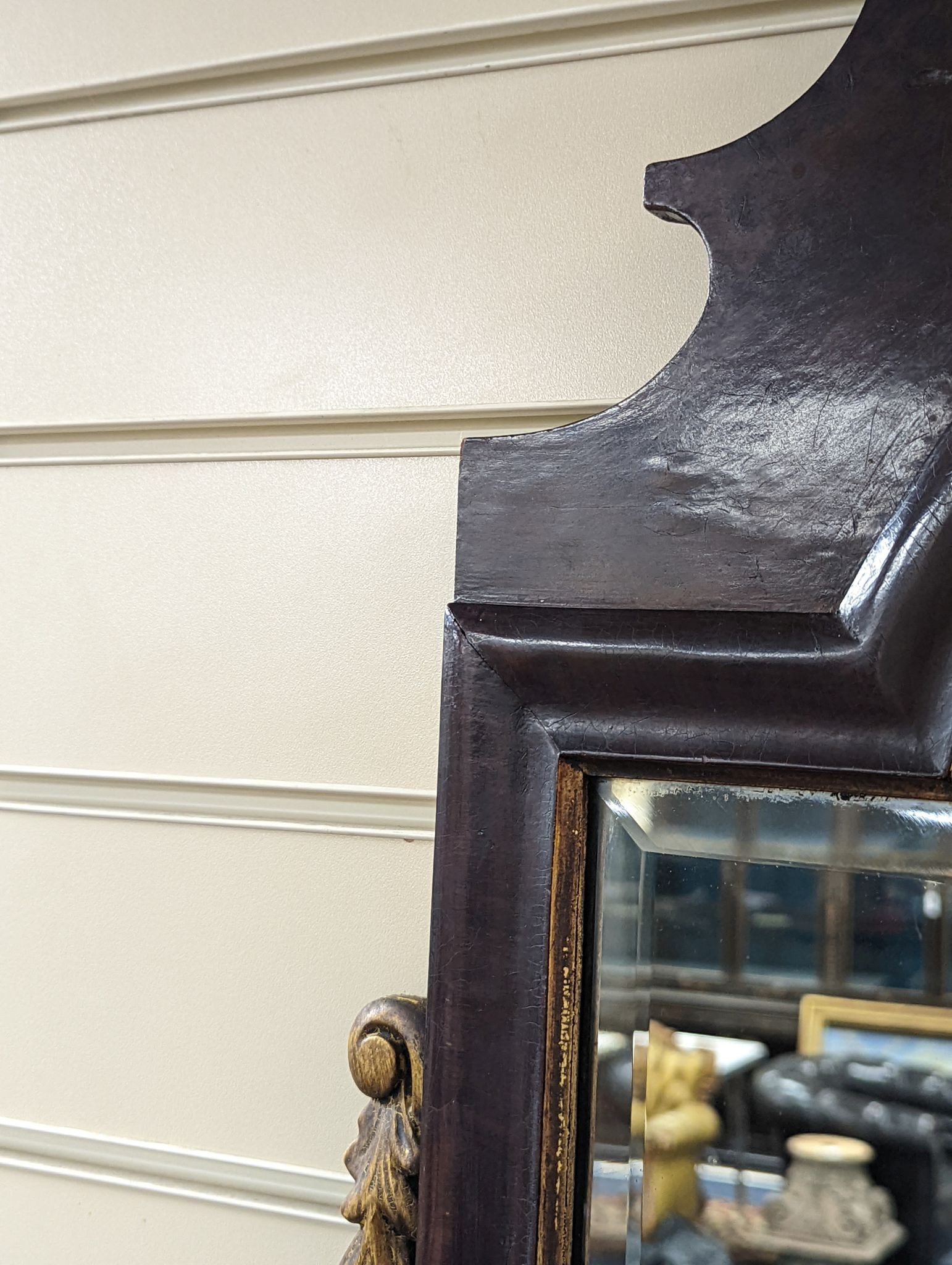 An early 20th century George III style parcel gilt fret cut mahogany wall mirror, width 59cm, height 112cm